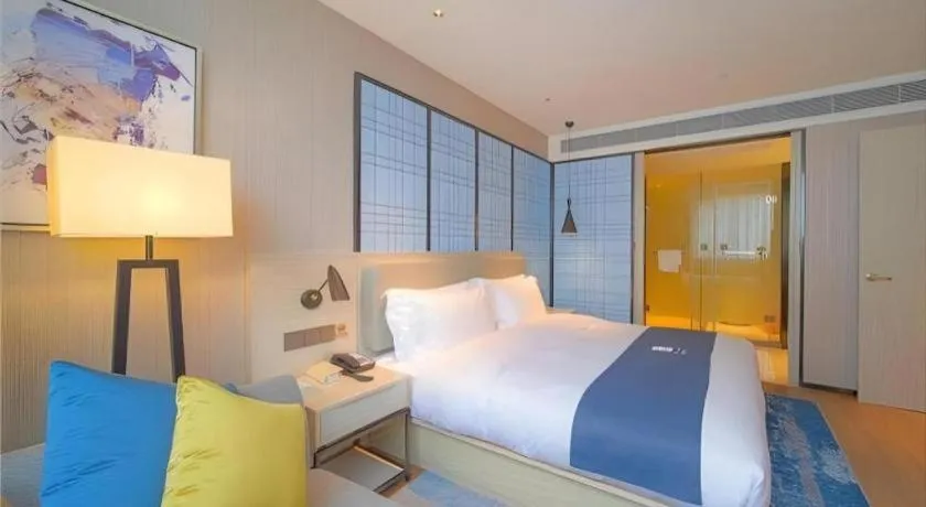 Bed in Echarm Hotel Guangzhou Changlong Shiqiao Metro Station