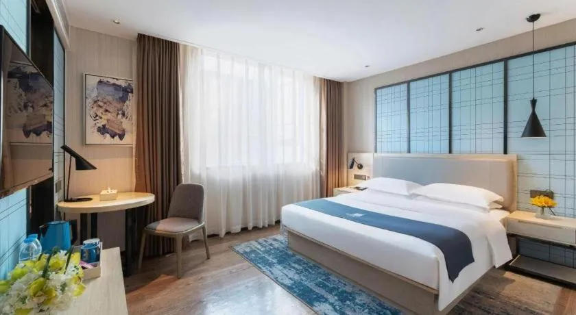 Bed in Echarm Hotel Guangzhou Changlong Shiqiao Metro Station