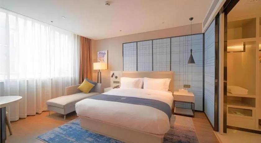 Bed in Echarm Hotel Guangzhou Changlong Shiqiao Metro Station