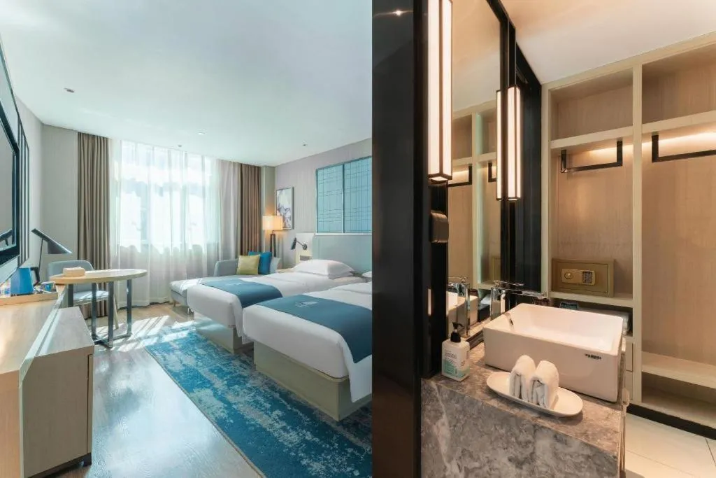 Bed in Echarm Hotel Guangzhou Changlong Shiqiao Metro Station