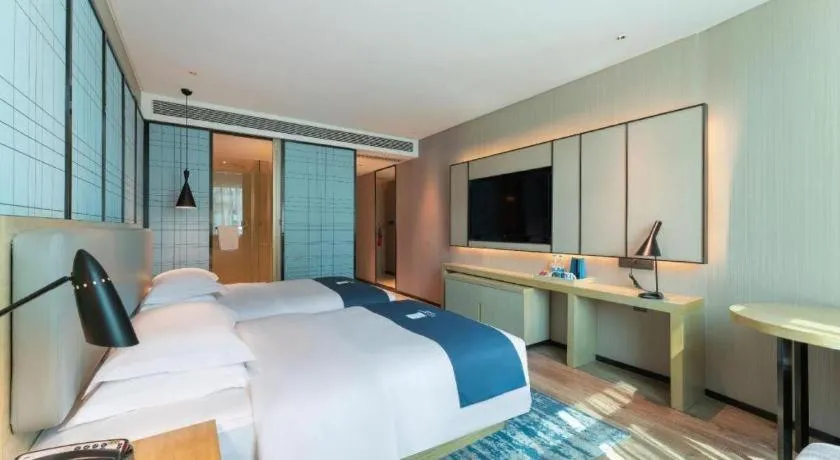 Bed in Echarm Hotel Guangzhou Changlong Shiqiao Metro Station