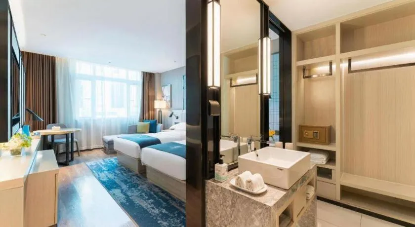 Bed in Echarm Hotel Guangzhou Changlong Shiqiao Metro Station