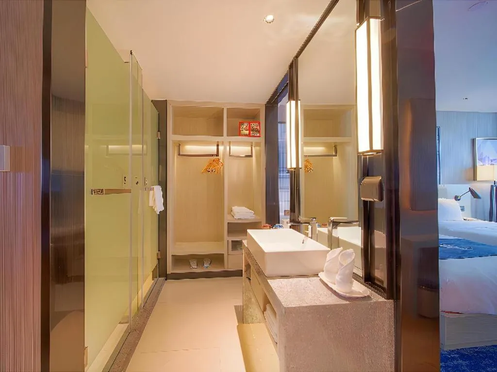 Bed in Echarm Hotel Guangzhou Changlong Shiqiao Metro Station