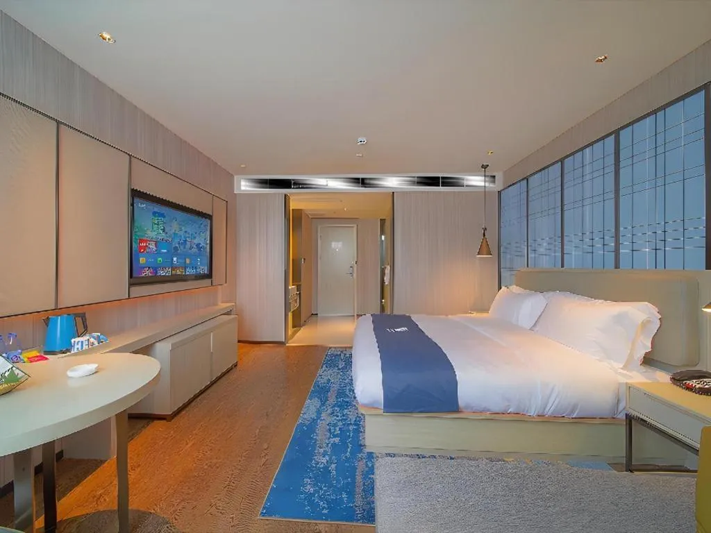 Bed in Echarm Hotel Guangzhou Changlong Shiqiao Metro Station