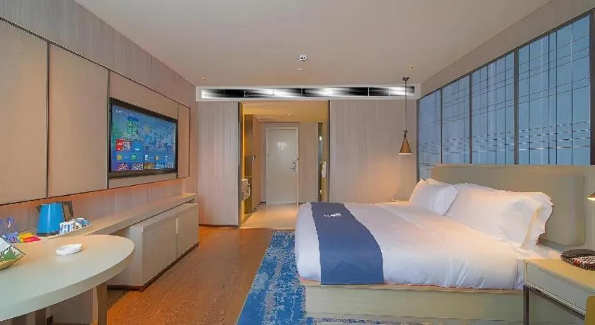 Bed in Echarm Hotel Guangzhou Changlong Shiqiao Metro Station