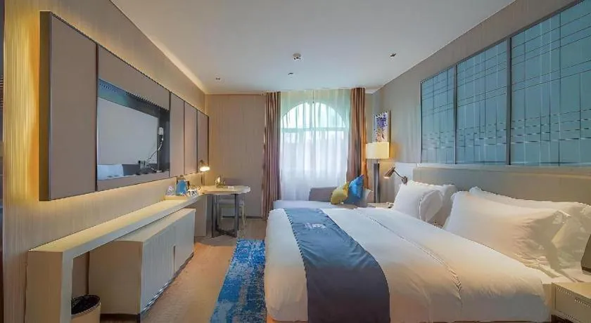 Bed in Echarm Hotel Guangzhou Changlong Shiqiao Metro Station