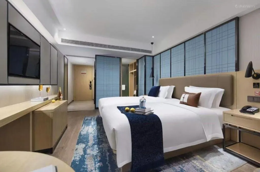 Bed in Echarm Hotel Guangzhou Tonghe Dayuan Times Square