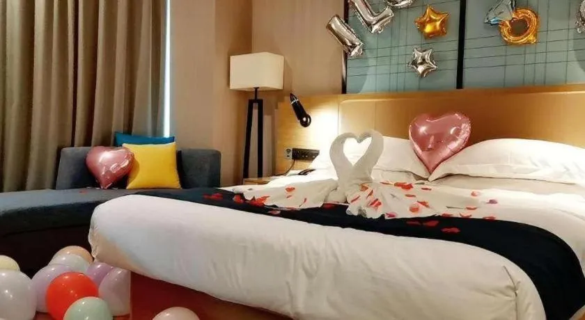 Bed in Echarm Hotel Guangzhou Tonghe Dayuan Times Square