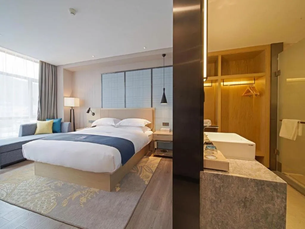 Bed in Echarm Hotel Guangzhou Tonghe Dayuan Times Square