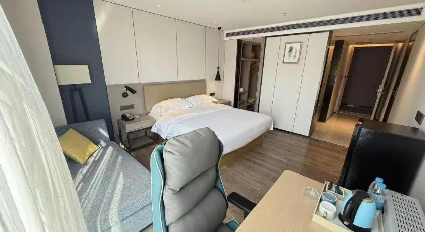 Bed in Echarm Hotel Guangzhou Tonghe Dayuan Times Square