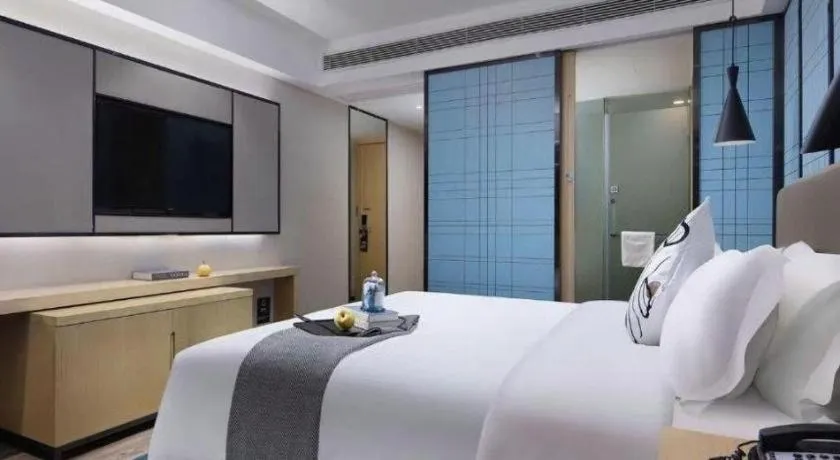 Bed in Echarm Hotel Guangzhou Tonghe Dayuan Times Square