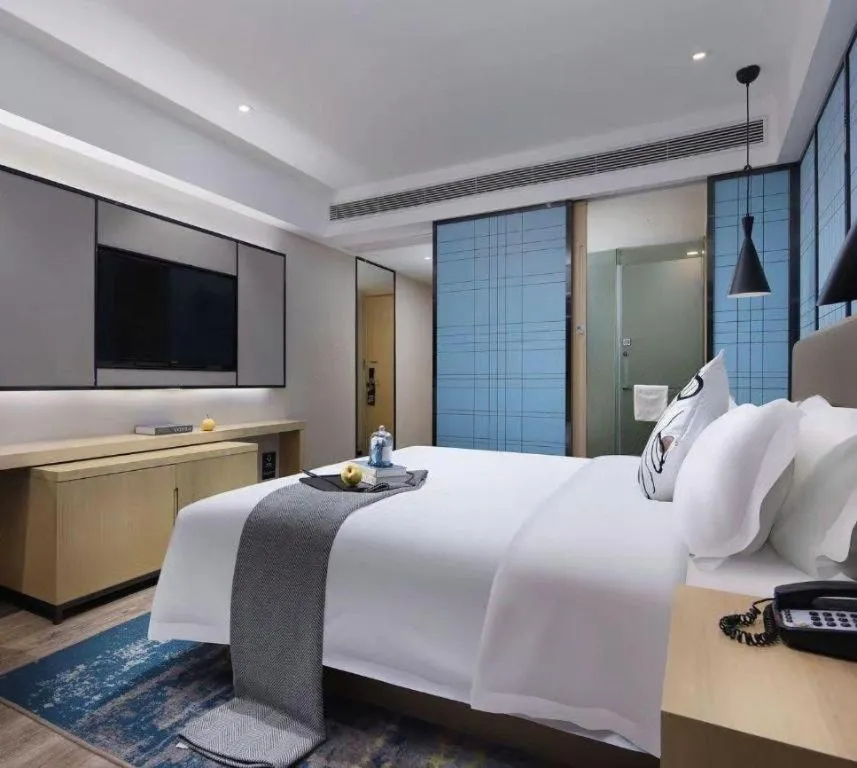 Bed in Echarm Hotel Guangzhou Tonghe Dayuan Times Square