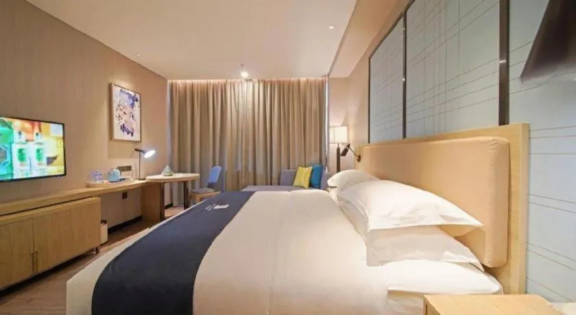 Bed in Echarm Hotel Guangzhou Tonghe Dayuan Times Square