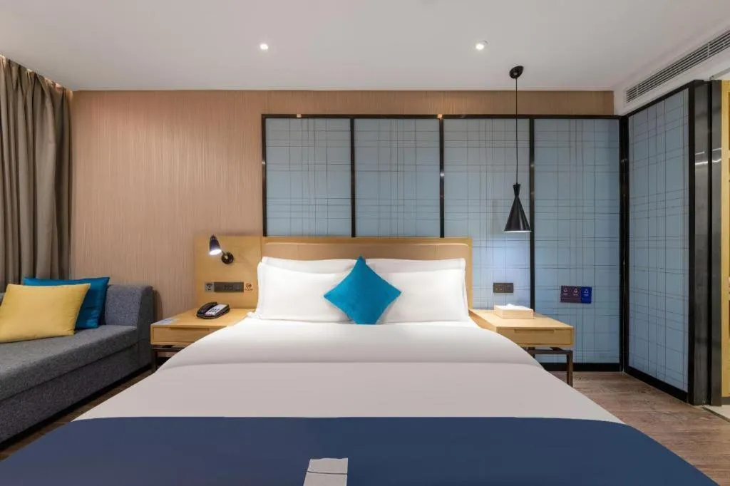 Bed in Echarm Hotel Guangzhou Tonghe Dayuan Times Square