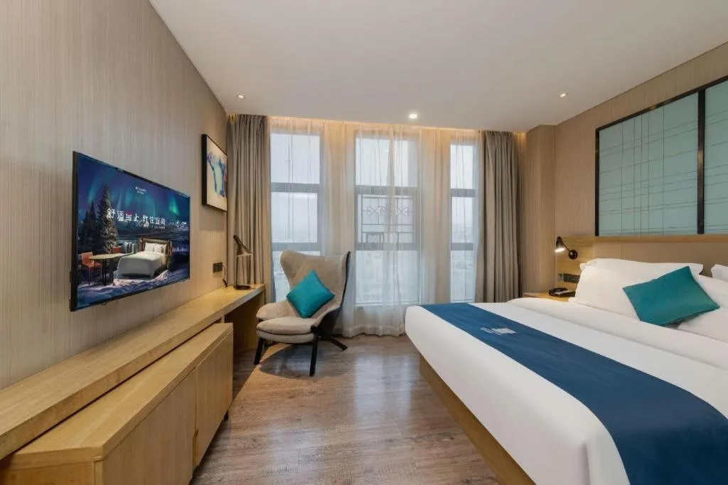 Bed in Echarm Hotel Guangzhou Tonghe Dayuan Times Square