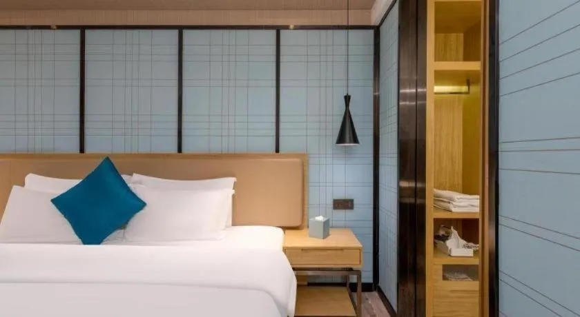 Bed in Echarm Hotel Guangzhou Tonghe Dayuan Times Square