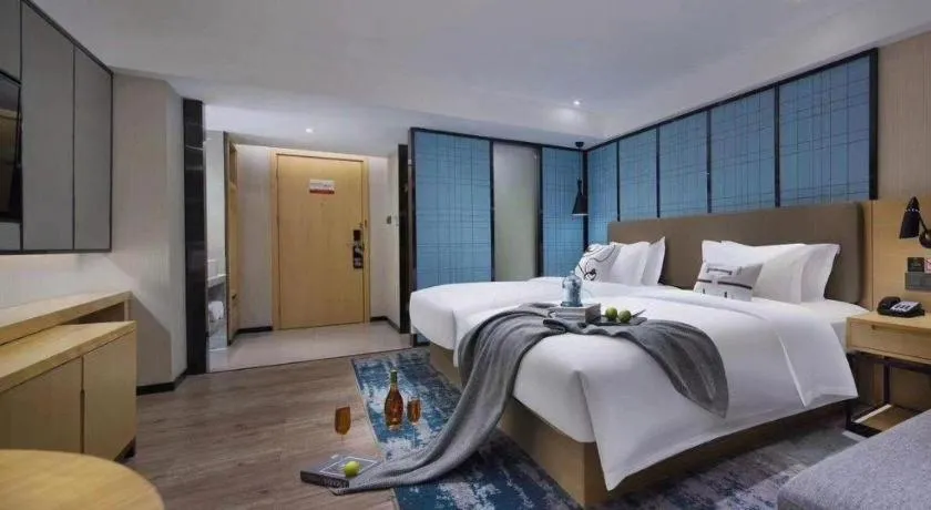 Bed in Echarm Hotel Guangzhou Tonghe Dayuan Times Square