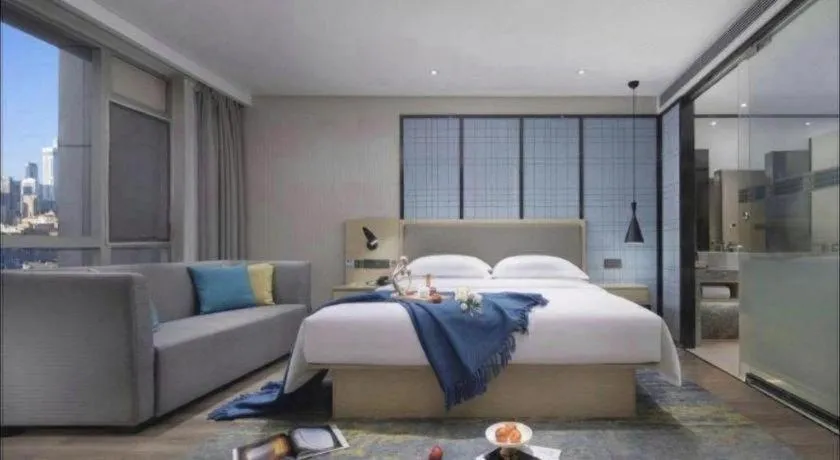 Bed in Echarm Hotel Guangzhou Tonghe Dayuan Times Square