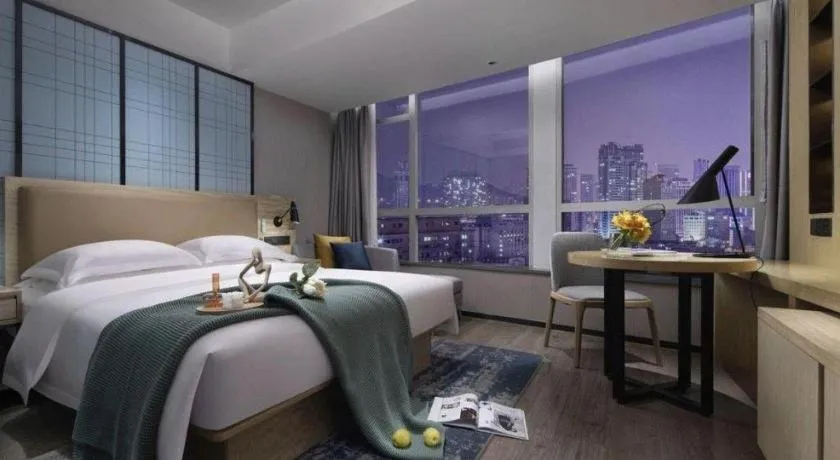 Bed in Echarm Hotel Guangzhou Tonghe Dayuan Times Square