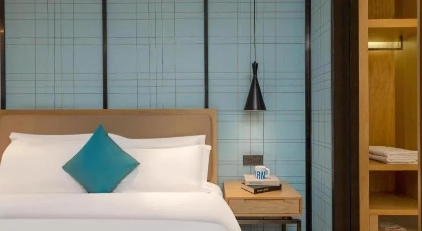 Bed in Echarm Hotel Guangzhou Tonghe Dayuan Times Square