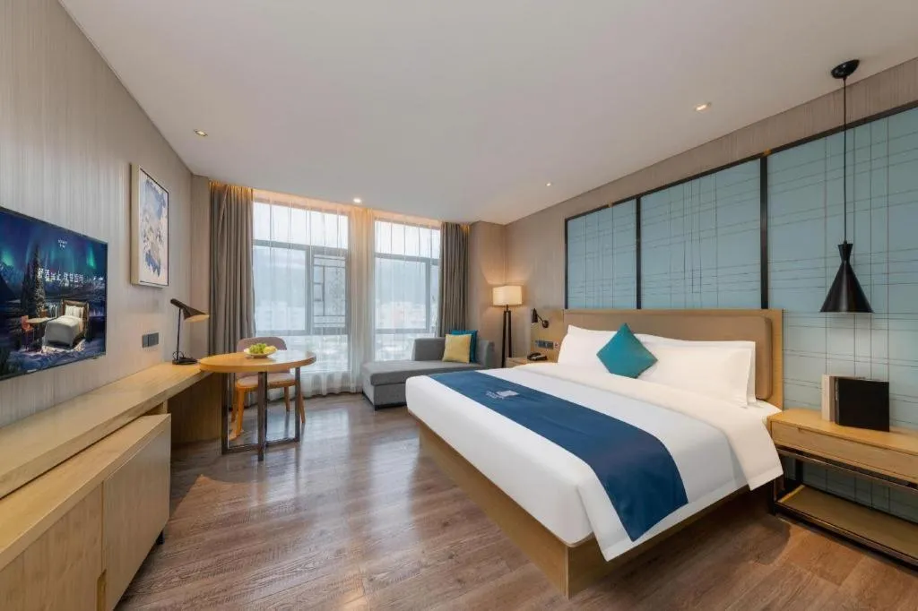 Bed in Echarm Hotel Guangzhou Tonghe Dayuan Times Square