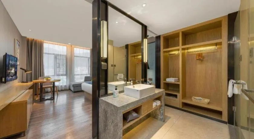 Bed in Echarm Hotel Guangzhou Tonghe Dayuan Times Square