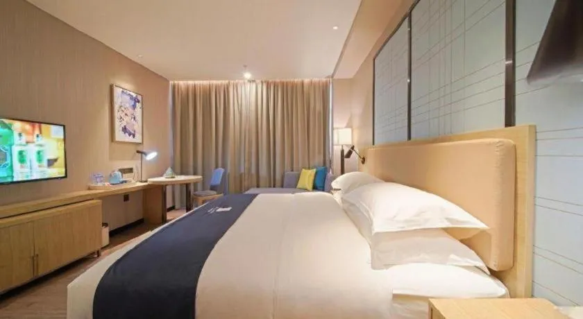 Bed in Echarm Hotel Guangzhou Tonghe Dayuan Times Square