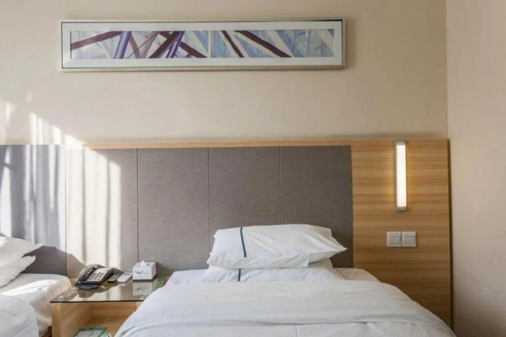 Bed in City Comfort Inn Guangzhou Tianhe District Tangxia Exhibition Center