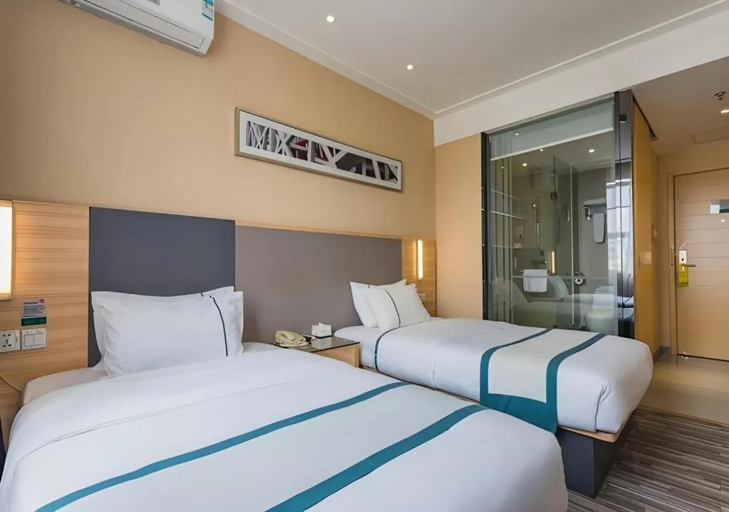 Bed in City Comfort Inn Guangzhou Tianhe District Tangxia Exhibition Center