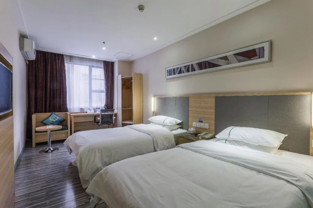 Bed in City Comfort Inn Guangzhou Tianhe District Tangxia Exhibition Center