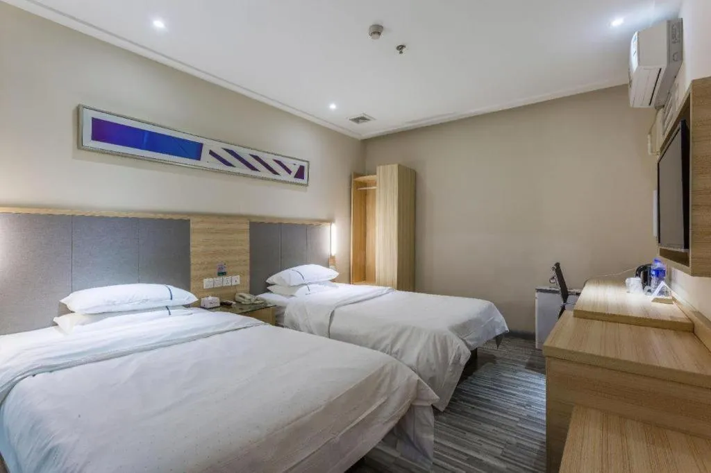 Bed in City Comfort Inn Guangzhou Tianhe District Tangxia Exhibition Center