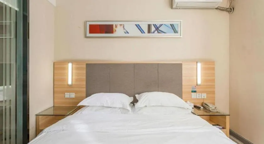 Bed in City Comfort Inn Guangzhou Tianhe District Tangxia Exhibition Center