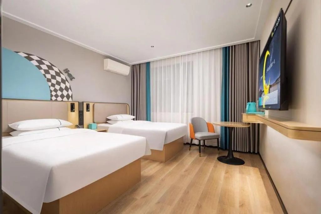 Bed in City Comfort Inn Wuhan Jinyinhu Garden Expo Park