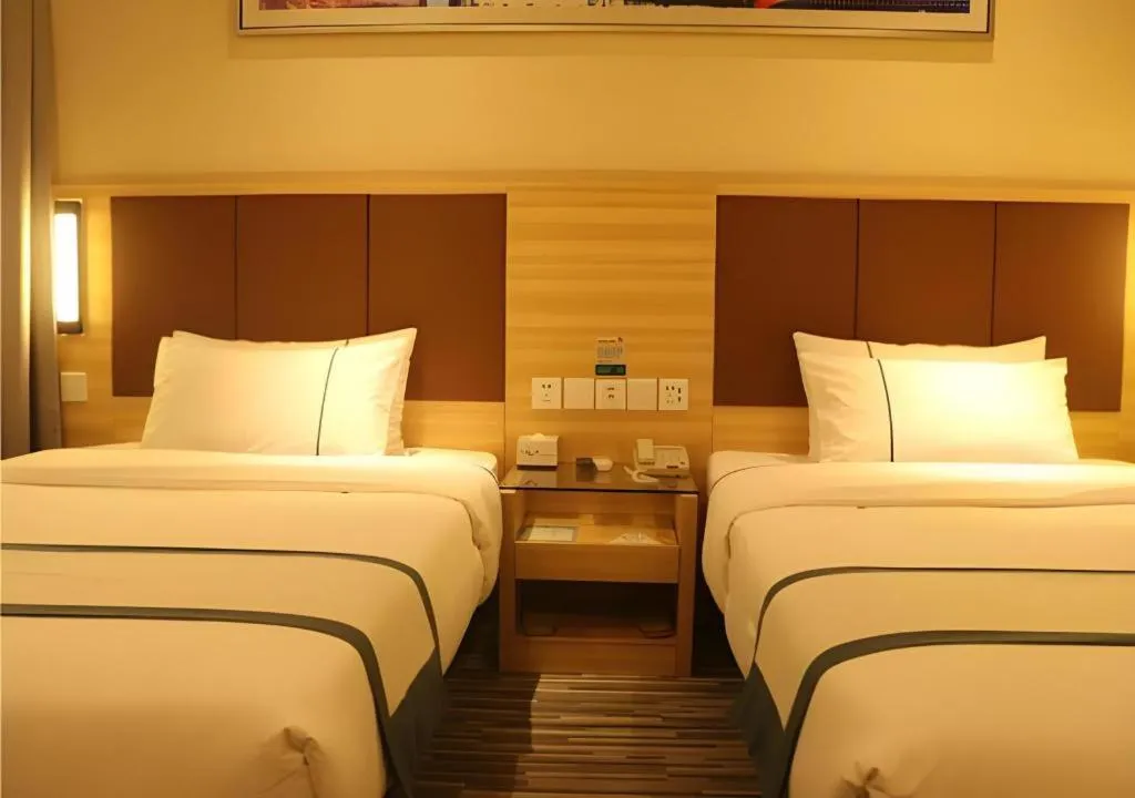 Bed in City Comfort Inn Wuhan Jinyinhu Garden Expo Park