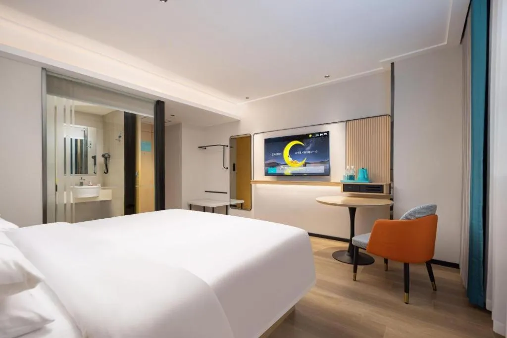 Bed in City Comfort Inn Wuhan Jinyinhu Garden Expo Park