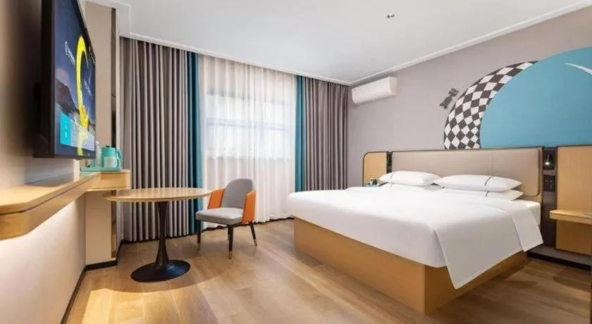 Bed in City Comfort Inn Wuhan Jinyinhu Garden Expo Park