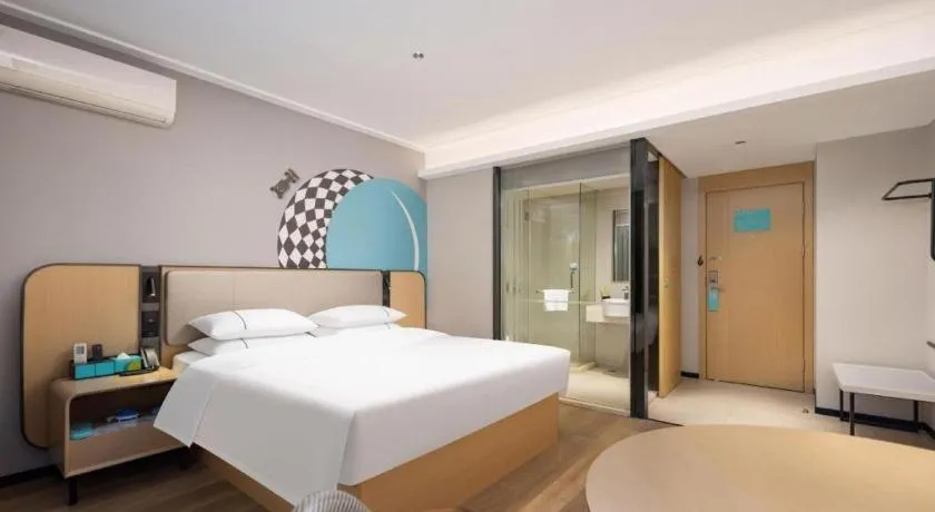 Bed in City Comfort Inn Wuhan Jinyinhu Garden Expo Park