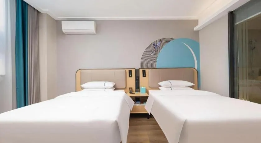 Bed in City Comfort Inn Wuhan Jinyinhu Garden Expo Park