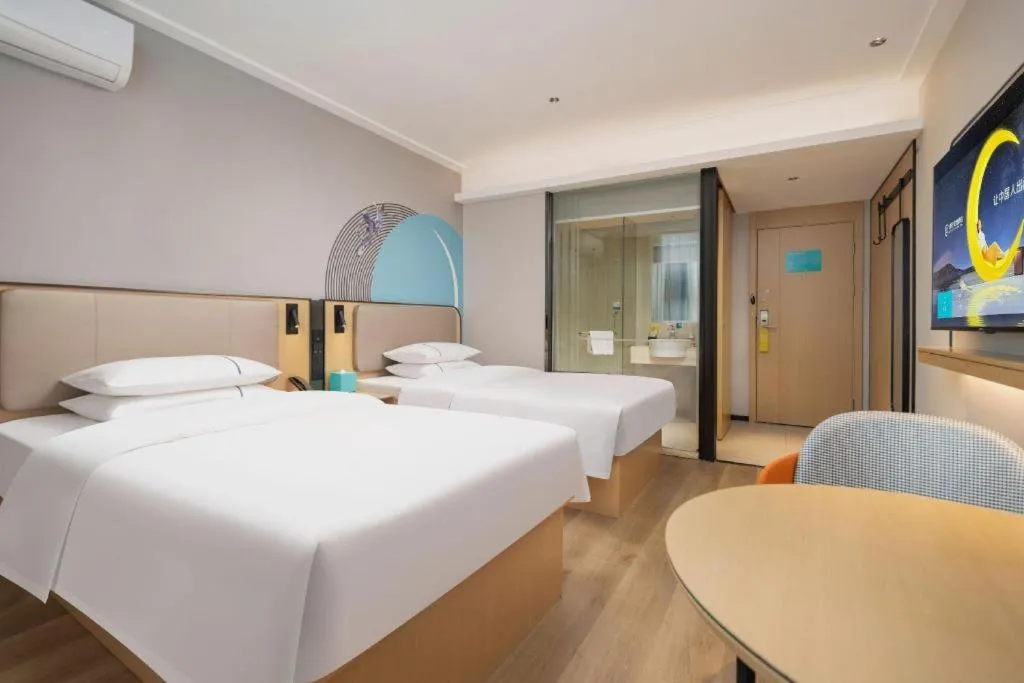 Bed in City Comfort Inn Wuhan Jinyinhu Garden Expo Park