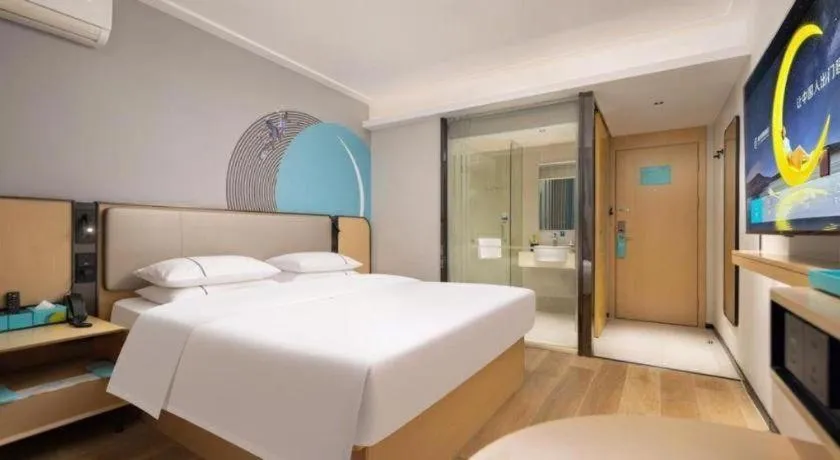Bed in City Comfort Inn Wuhan Jinyinhu Garden Expo Park