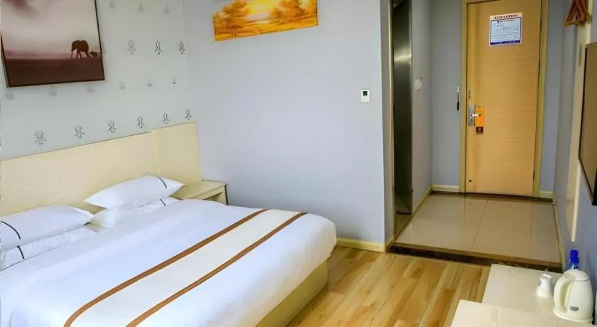 Bed in Jtour Inn Fengcheng Railway Station Jianyi Avenue Xincheng