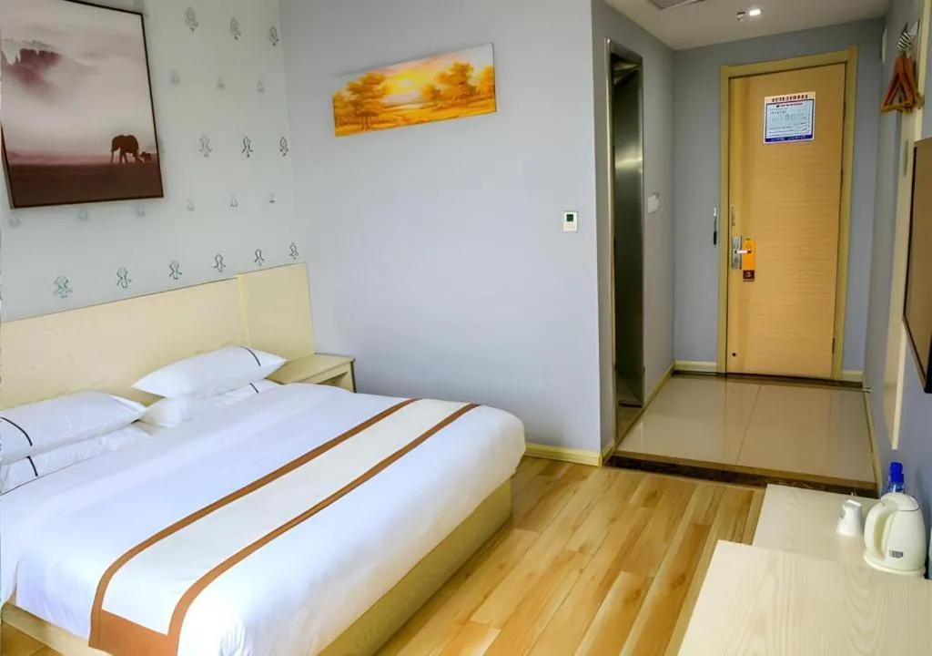 Bed in Jtour Inn Fengcheng Railway Station Jianyi Avenue Xincheng