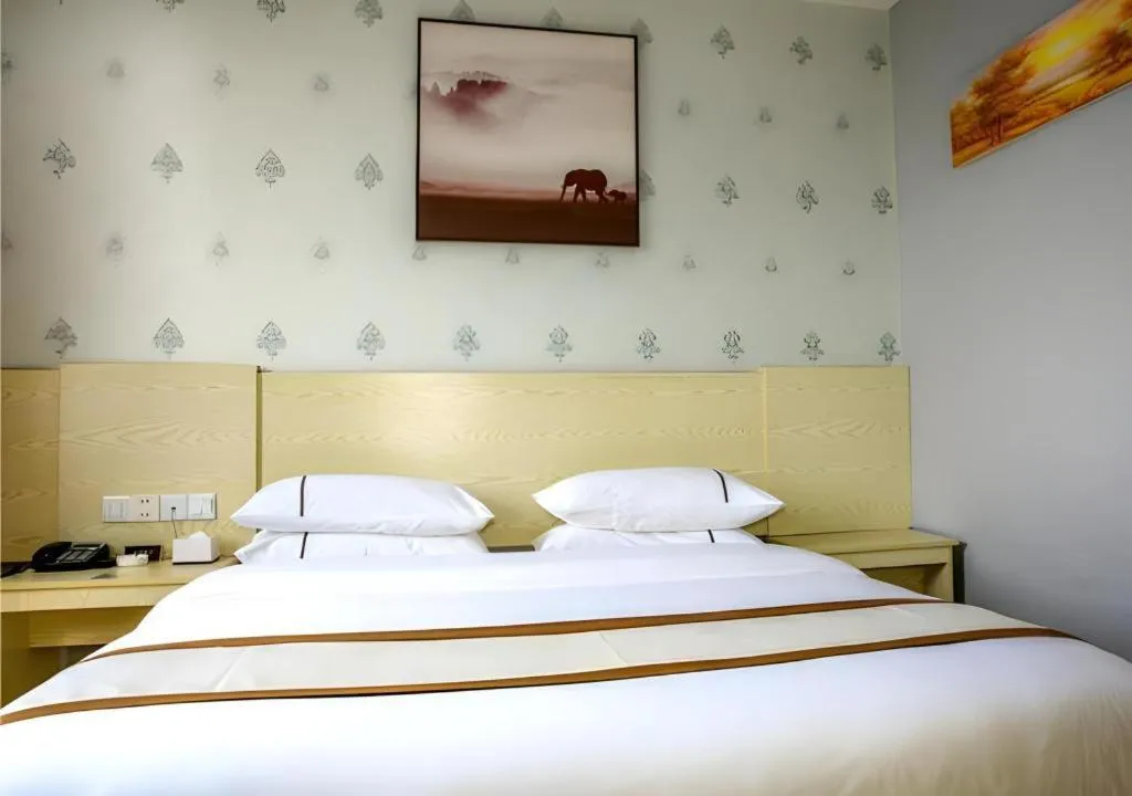 Bed in Jtour Inn Fengcheng Railway Station Jianyi Avenue Xincheng