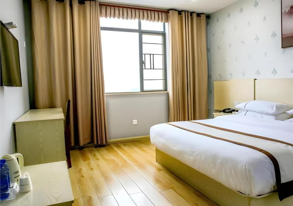 Bed in Jtour Inn Fengcheng Railway Station Jianyi Avenue Xincheng