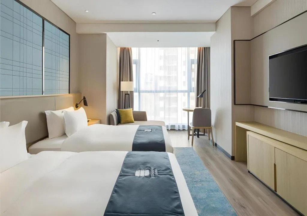 Bed in Echarm Hotel Changsha High-speed Railway Station