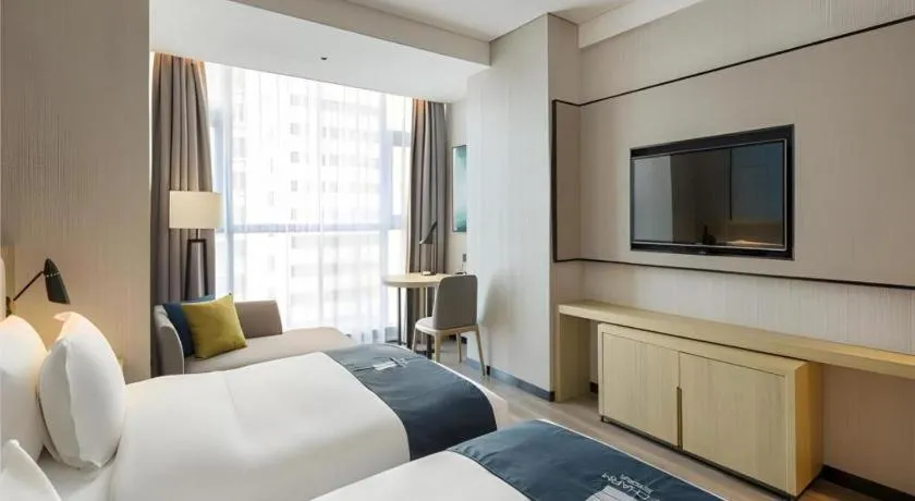 Bed in Echarm Hotel Changsha High-speed Railway Station