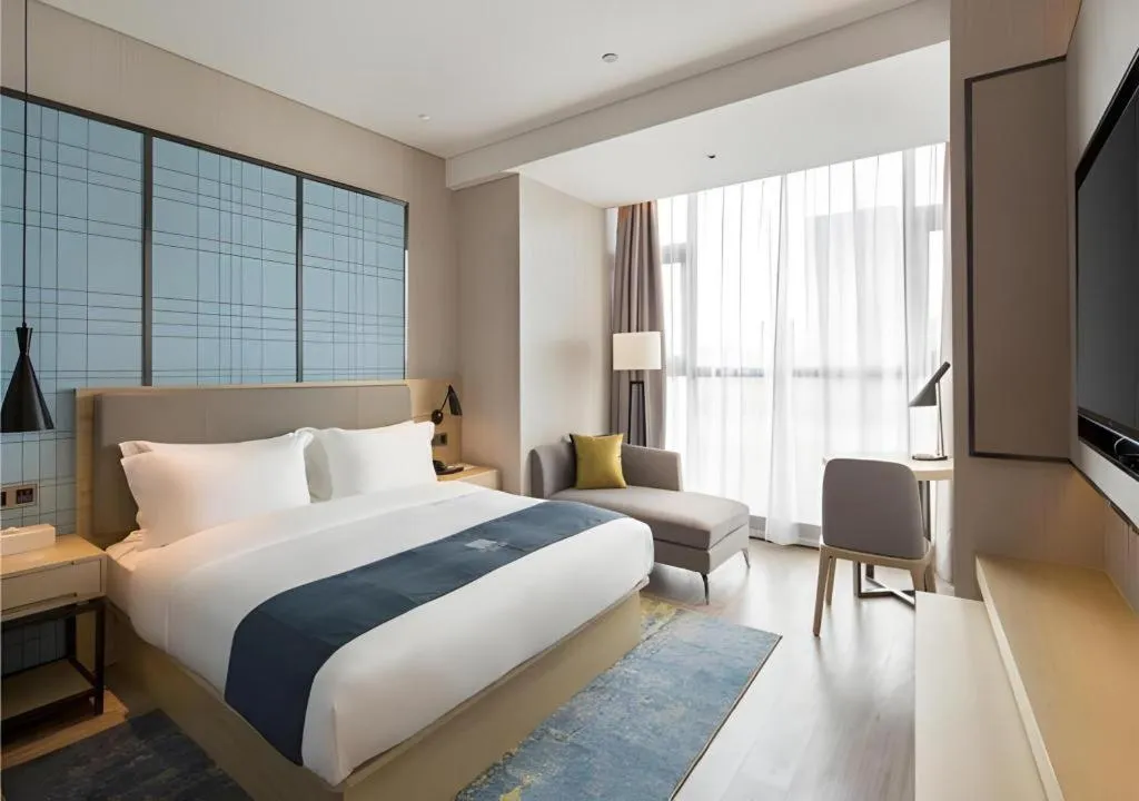 Bed in Echarm Hotel Changsha High-speed Railway Station