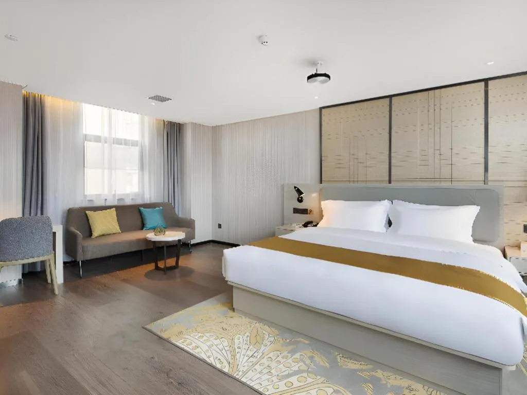 Bed in Echarm Hotel Changsha Guihua Park Metro Station