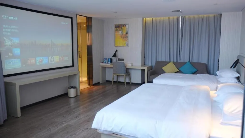 Bed in Echarm Hotel Changsha Guihua Park Metro Station