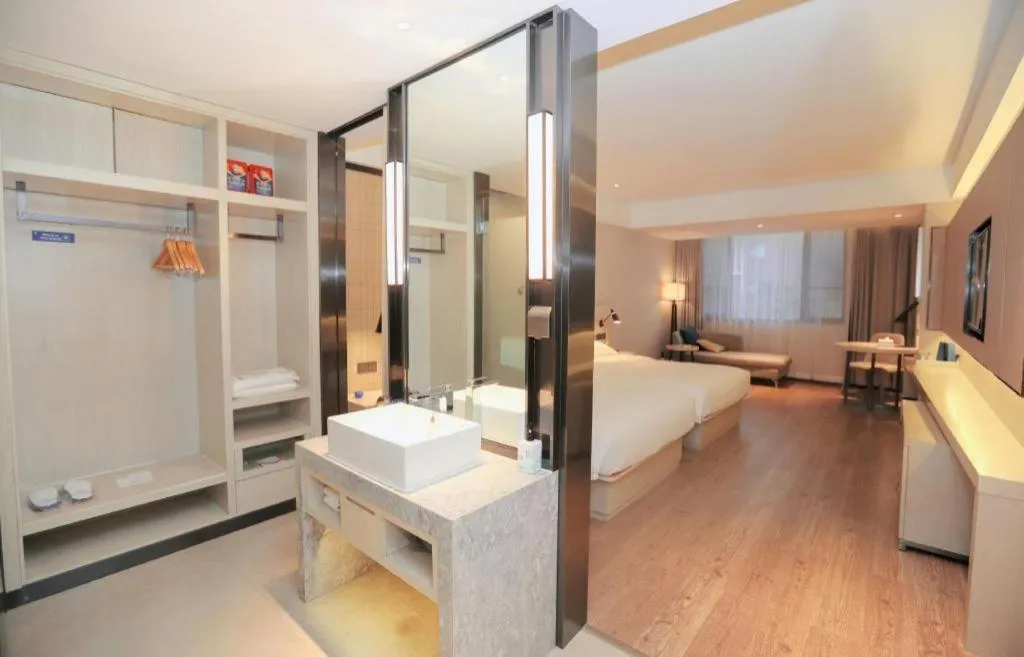 Bed in Echarm Hotel Changsha Guihua Park Metro Station